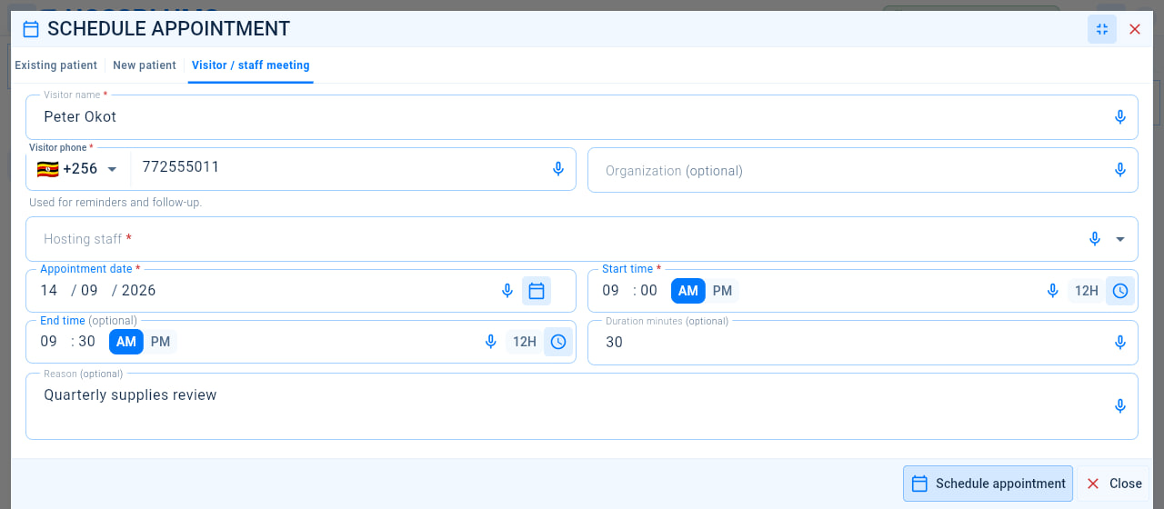 The Visitor / staff meeting tab of the Schedule appointment window, with the visitor’s name and phone, organisation, hosting staff member, date, times and reason.